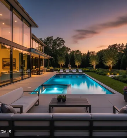 a view of pool with lawn chairs and a yard