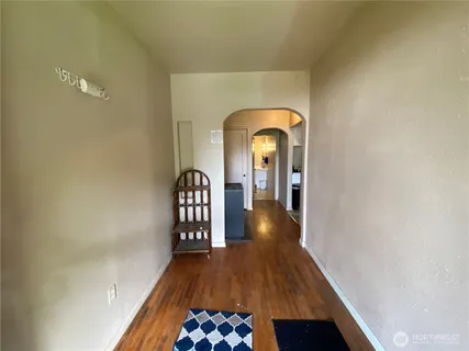 a view of entryway with wooden floor
