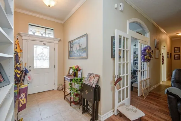 a view of a livingroom with furniture and closet
