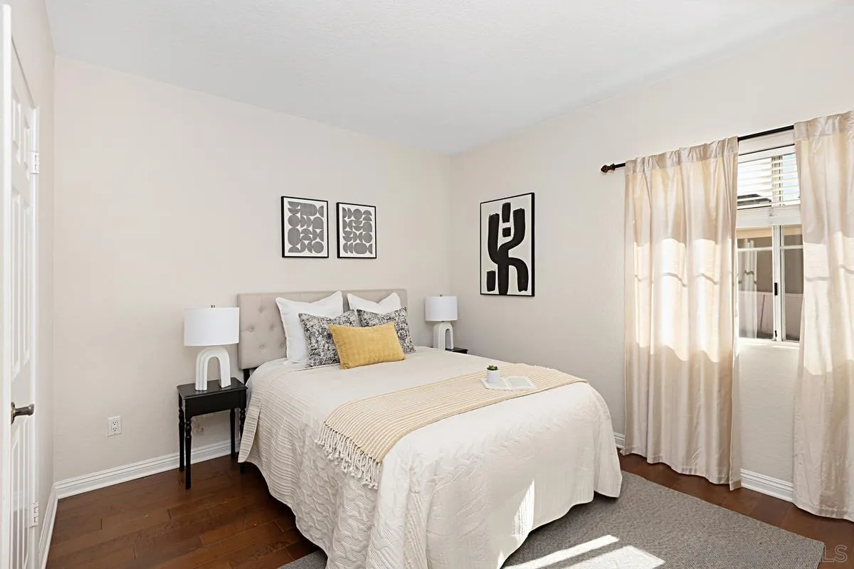 3620 Third Avenue, Unit 104 San Diego, CA 92103 - Photo 4 of 7 a bedroom with a bed and a window