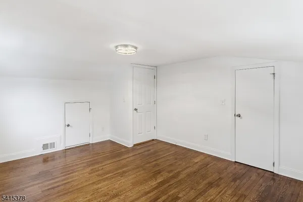 a bathroom with a sink a mirror and a toilet