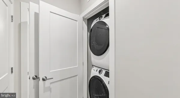 a close up view of a washer and dryer in a utility room