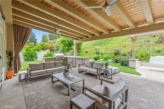 a outdoor living space with furniture and garden view