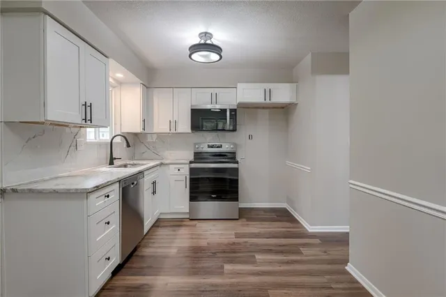 $295,000 | 8304 Hemlock Street, Overland Park, KS 66212