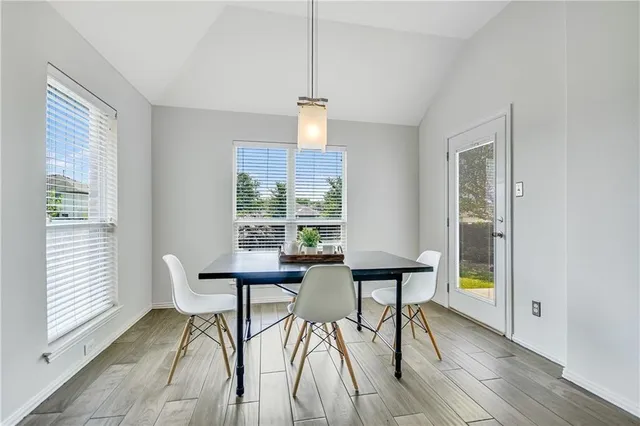 a view of a room with furniture window and wooden floor