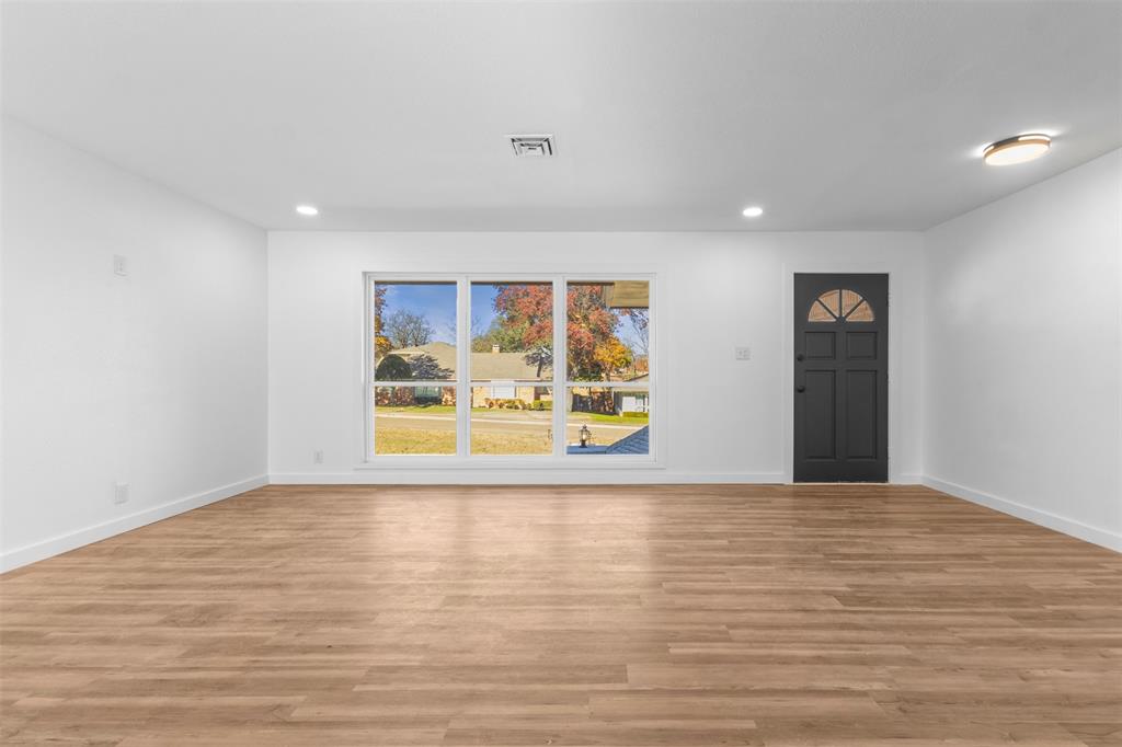 924 Whitestone Lane Dallas, TX 75232 - Photo 26 of 32 a view of an empty room with a window