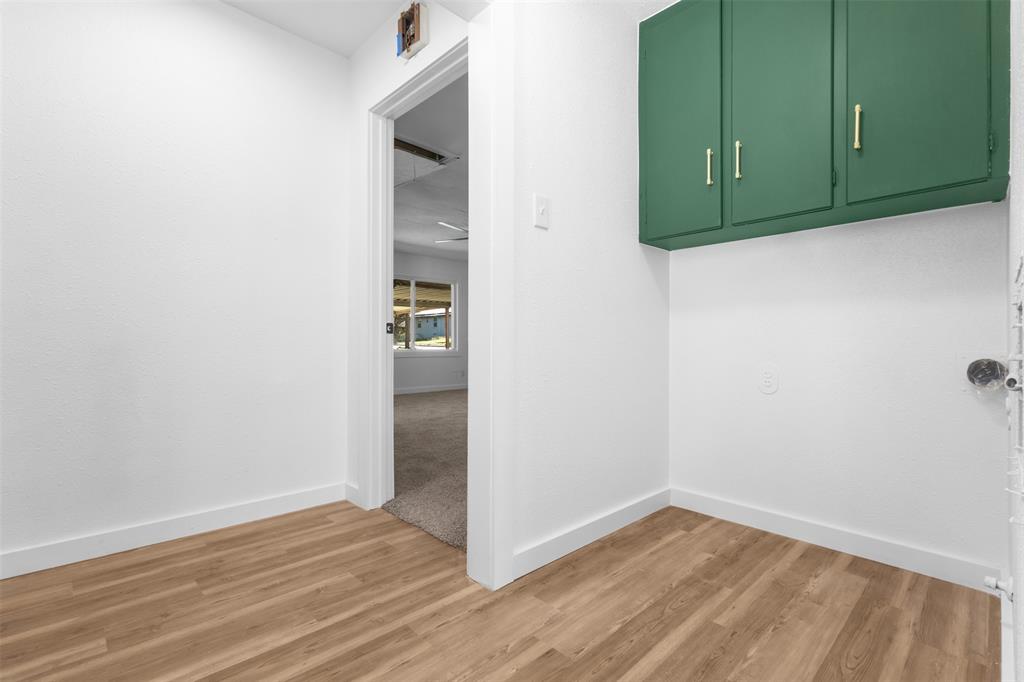 924 Whitestone Lane Dallas, TX 75232 - Photo 29 of 32 a view of empty room with wooden floor