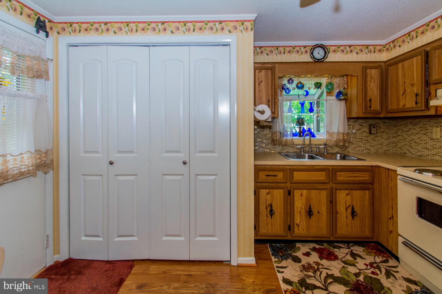 16 Sullivan Road Westminster, MD 21157 - Photo 11 of 28 front load stacking washer dryer behind doors