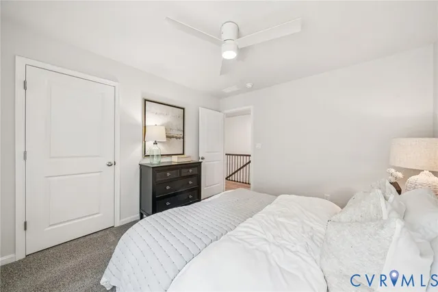 a bedroom with a bed and a closet