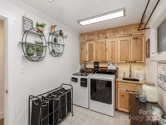 a kitchen with a stove and a sink