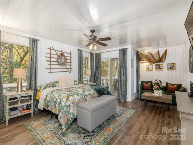 a bedroom with a bed and a couch