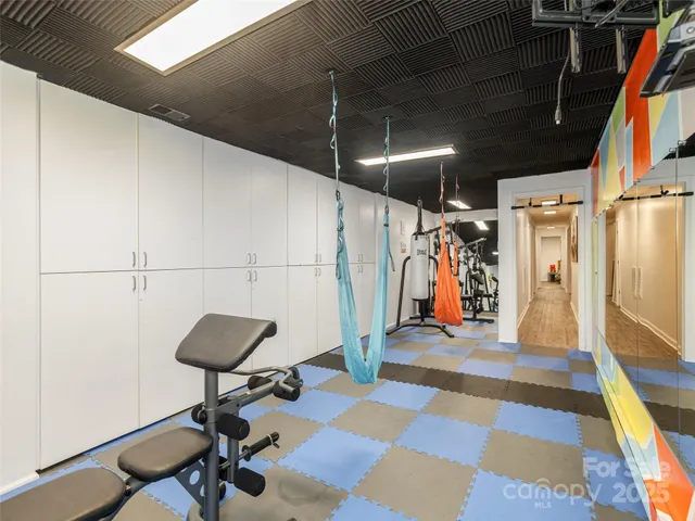a view of a room with gym equipment