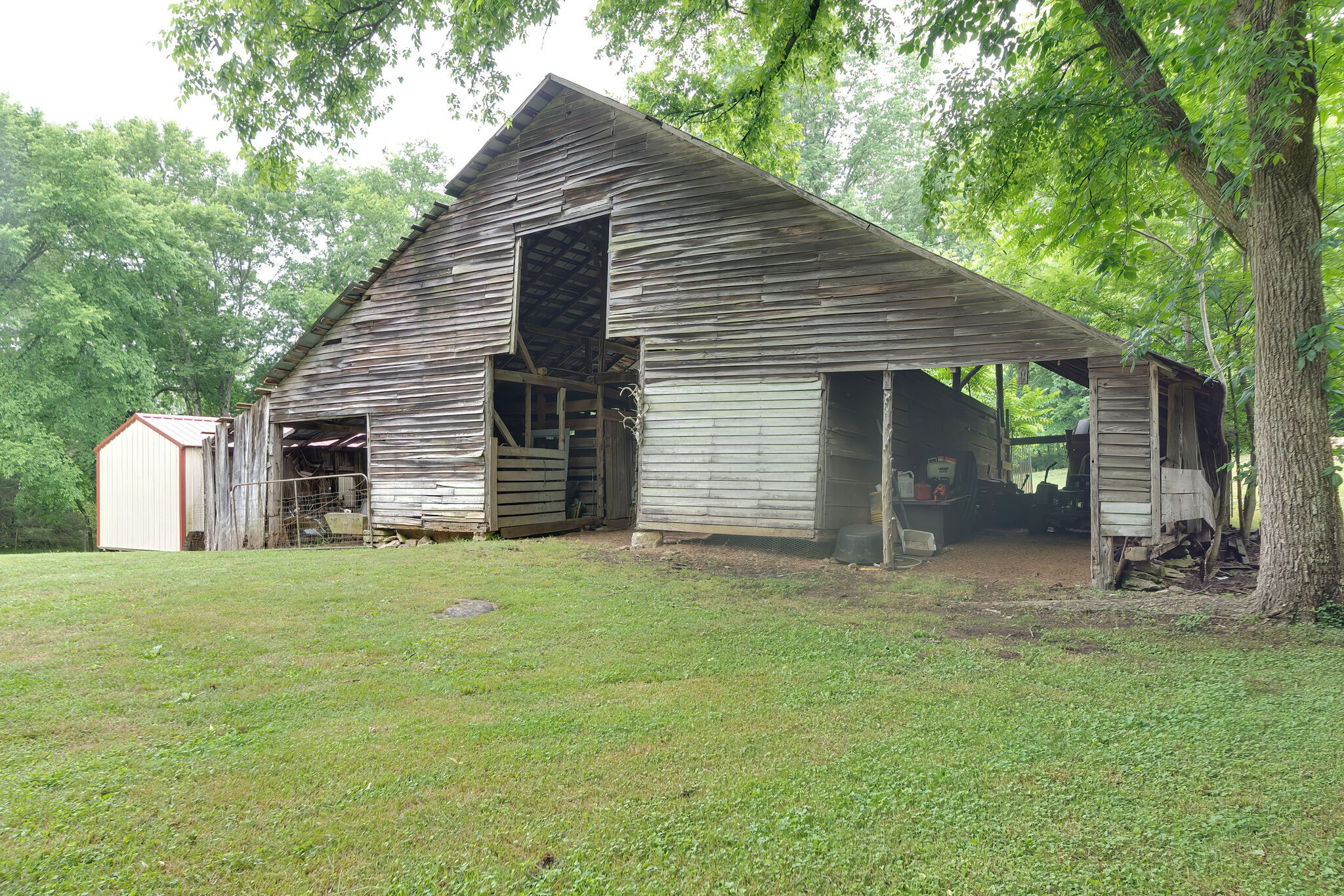 585 Shorts Road Pulaski, TN 38478 - Photo 30 of 32 a backyard of a house with seating space