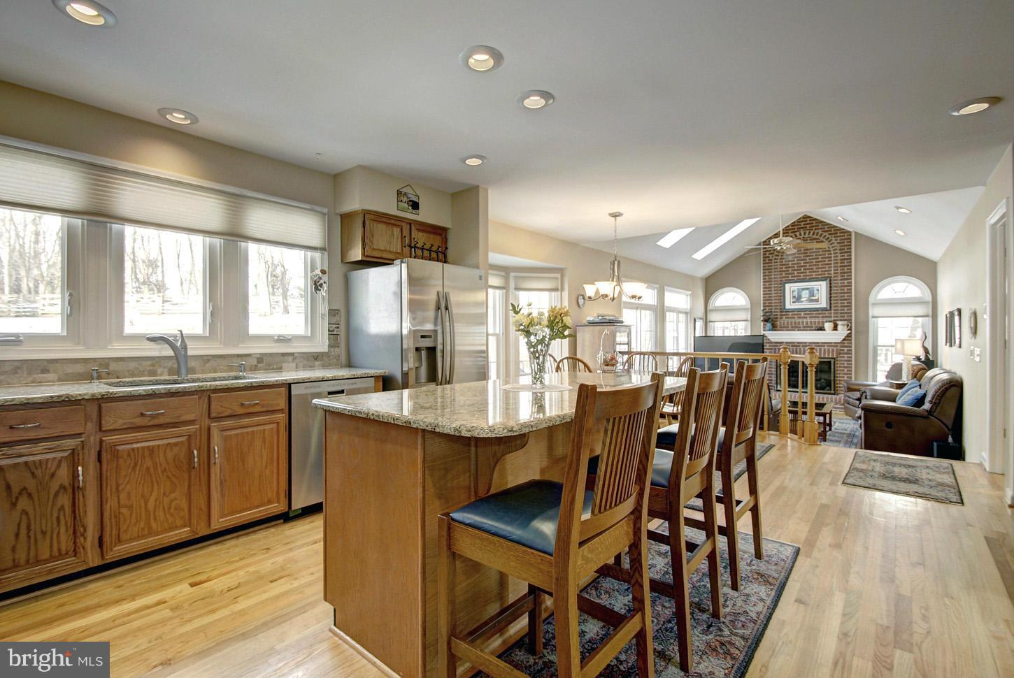 14528 Cutstone Way Silver Spring, MD 20905 - Photo 12 of 30 Center-Island Kitchen Opens to Family Room