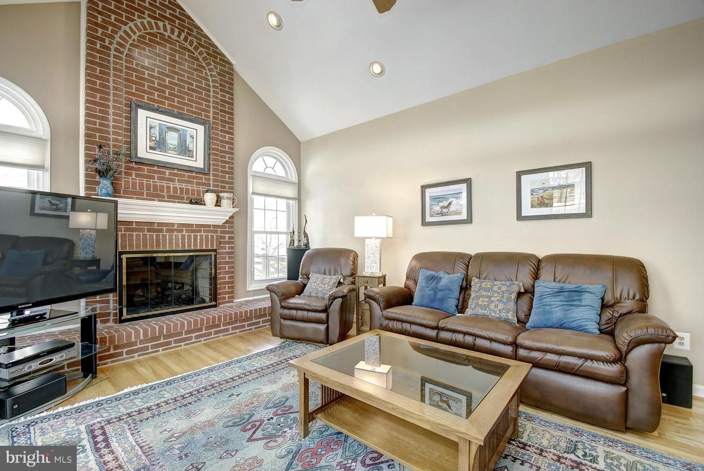 14528 Cutstone Way Silver Spring, MD 20905 - Photo 15 of 30 Family Room with Brick Hearth Fireplace