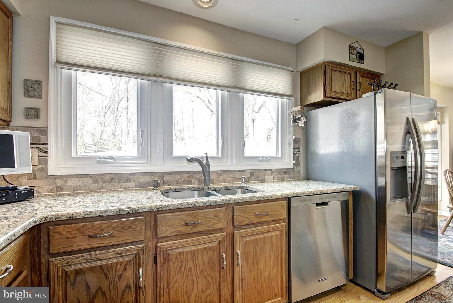 14528 Cutstone Way Silver Spring, MD 20905 - Photo 10 of 30 Kitchen with Views to Back Yard