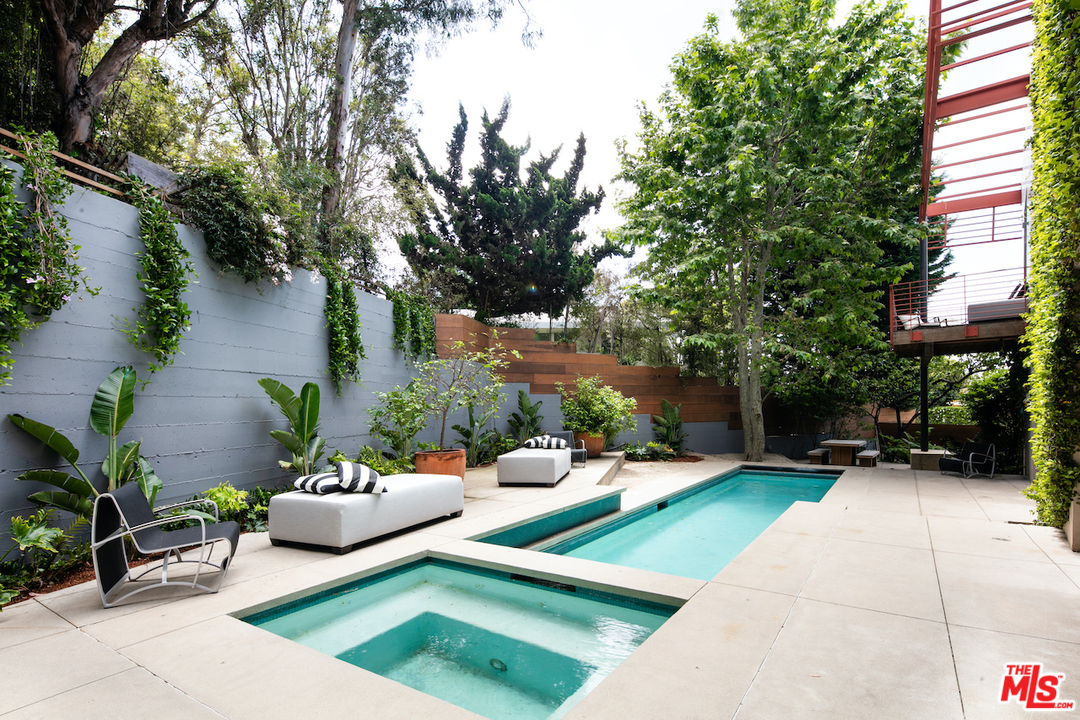 562 Stassi Lane Santa Monica, CA 90402 - Photo 24 of 33 a view of a backyard with sitting area and furniture