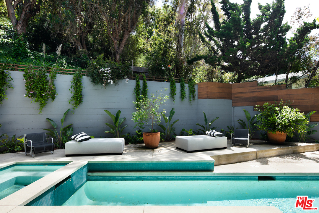 562 Stassi Lane Santa Monica, CA 90402 - Photo 25 of 33 a view of a patio with furniture and garden