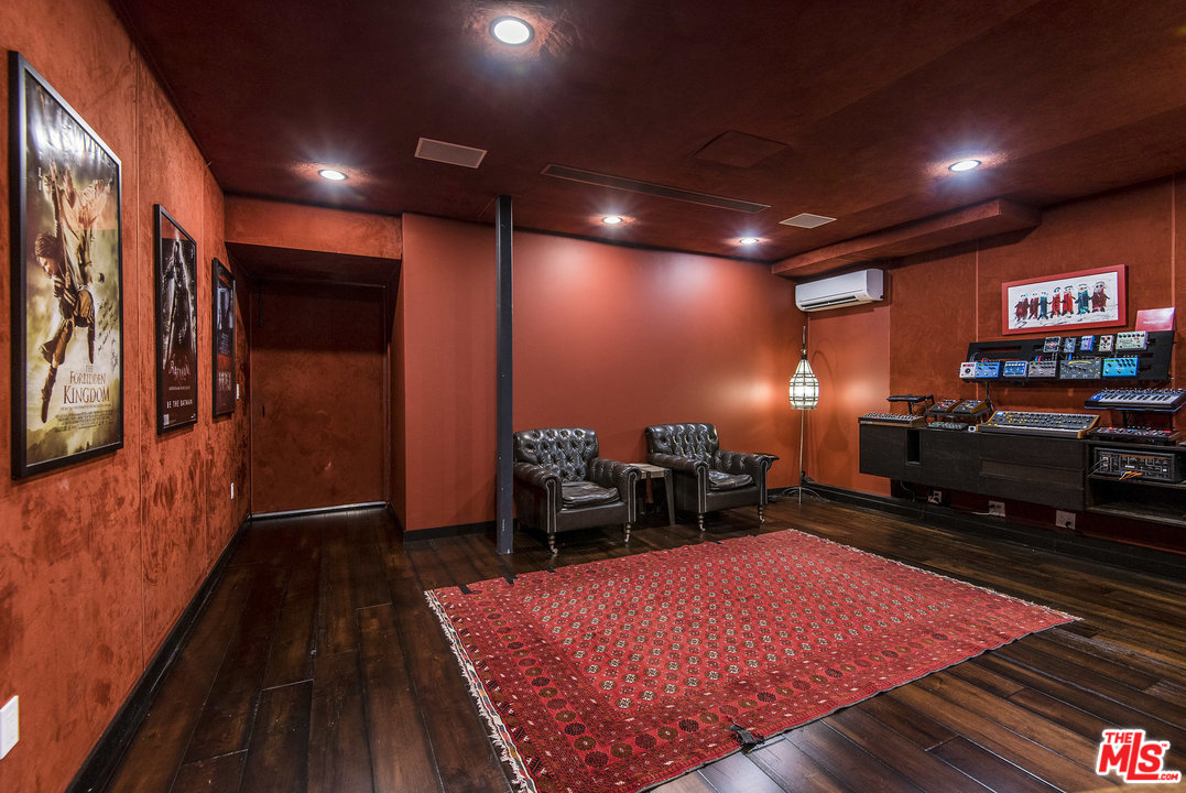 562 Stassi Lane Santa Monica, CA 90402 - Photo 31 of 33 a an empty room with wooden floor