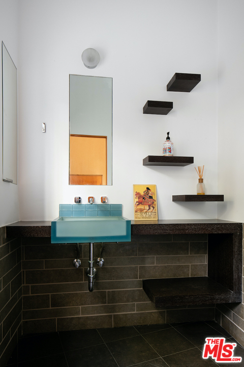 562 Stassi Lane Santa Monica, CA 90402 - Photo 9 of 33 a room with furniture and a potted plant