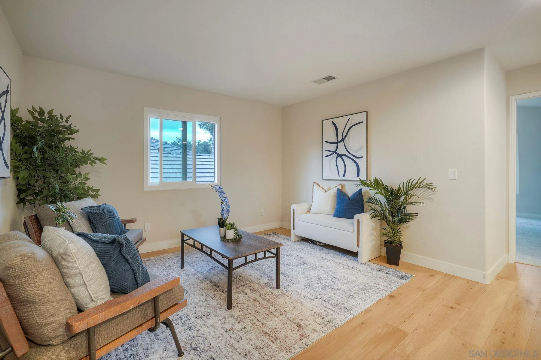 529 Peach Tree Way San Marcos, CA 92069 - Photo 14 of 30 a living room with furniture and a potted plant