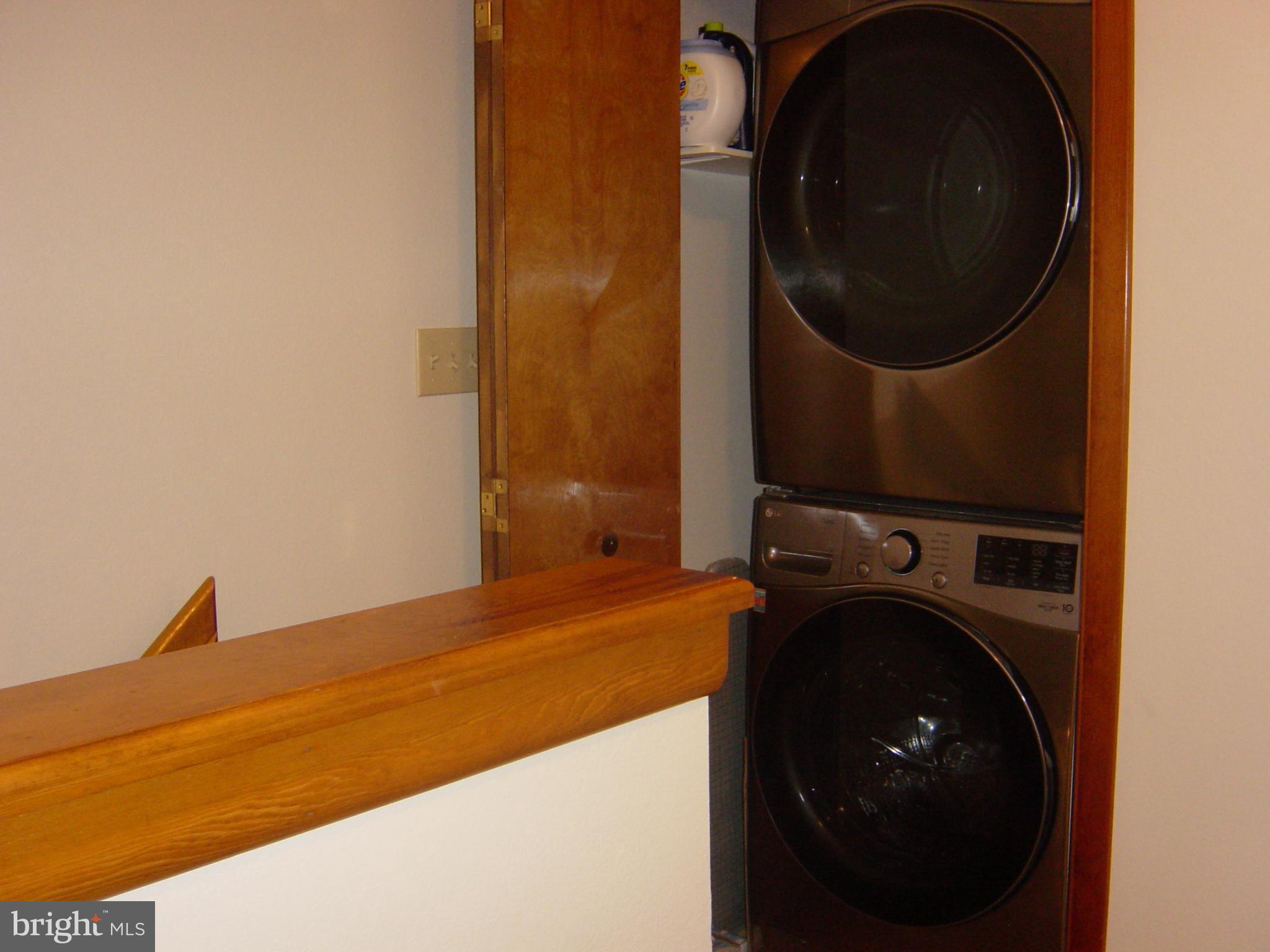 13609 Derrickson Avenue, Unit B Ocean City, MD 21842 - Photo 17 of 47 a close up view of a washer and dryer