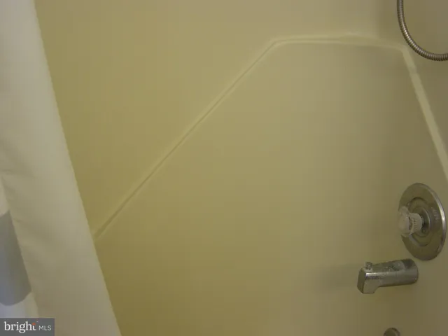 a bathroom with a sink and a shower