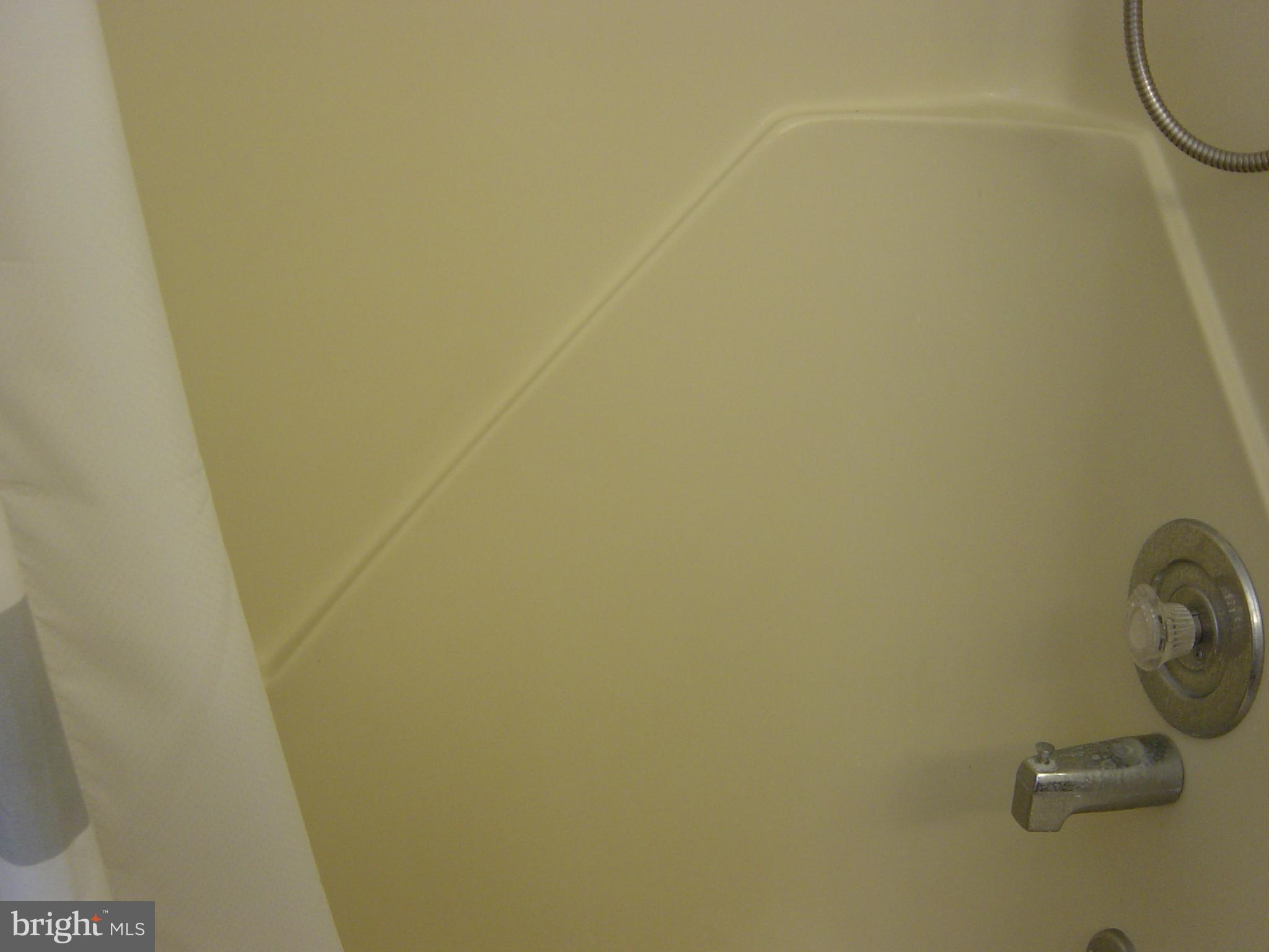 13609 Derrickson Avenue, Unit B Ocean City, MD 21842 - Photo 23 of 47 a bathroom with a shower