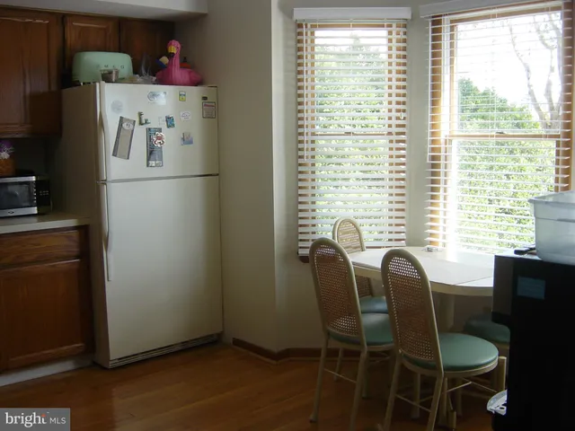 a view of balcony with wooden floor