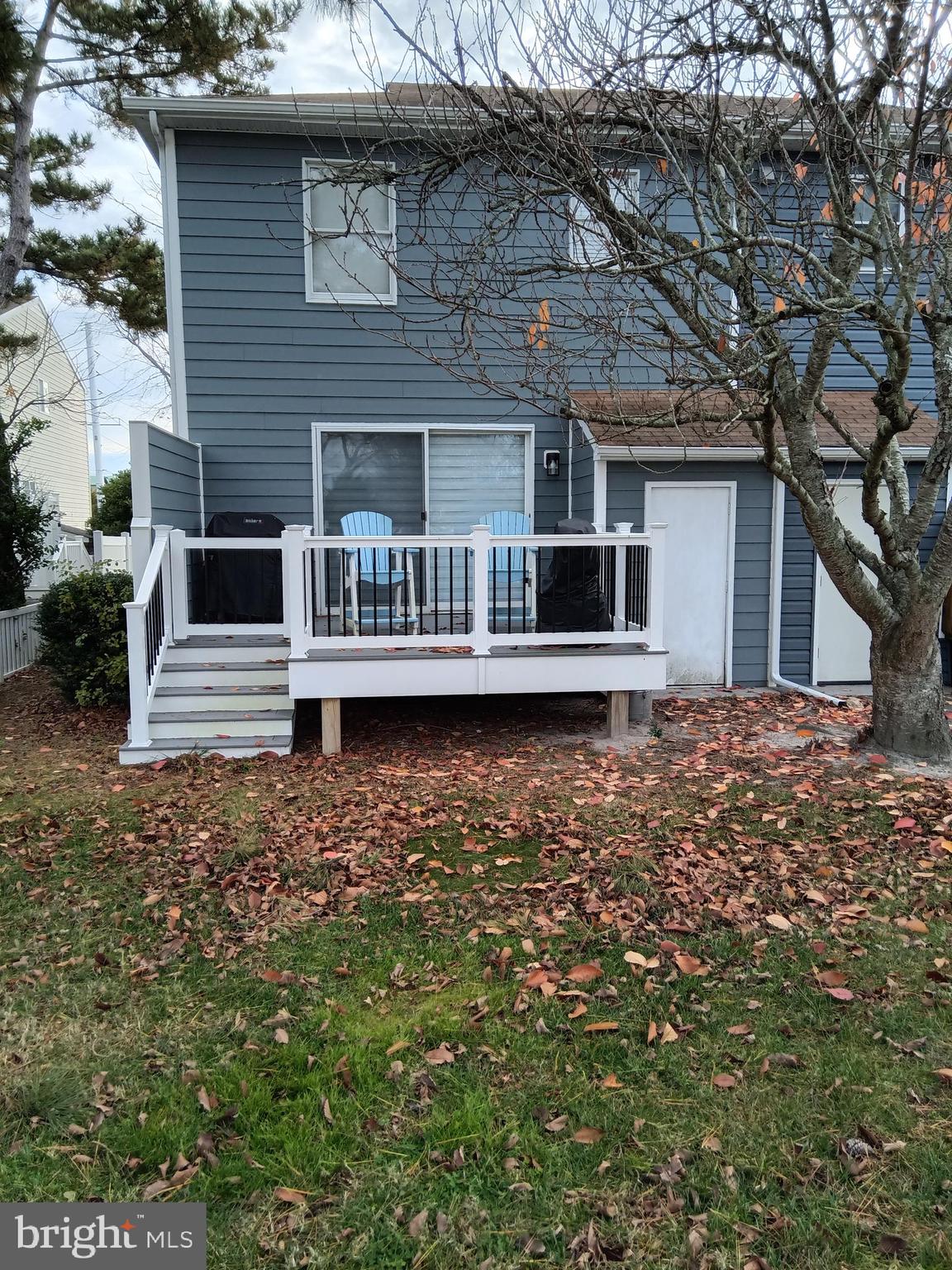 13609 Derrickson Avenue, Unit B Ocean City, MD 21842 - Photo 40 of 47 a view of house with backyard and deck