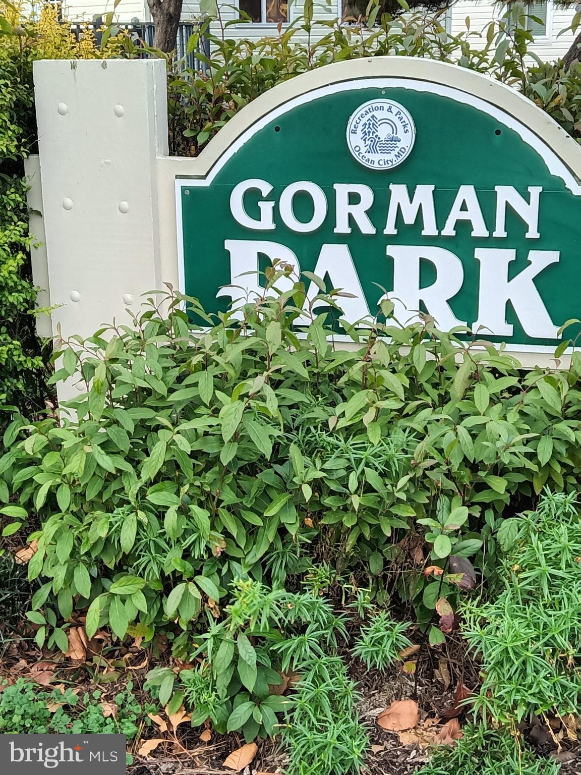 13609 Derrickson Avenue, Unit B Ocean City, MD 21842 - Photo 41 of 47 a sign that is on a brick wall