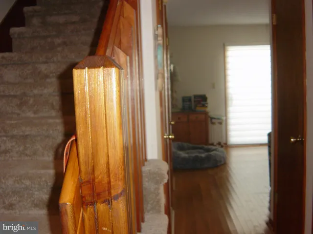 a view of a dining room with furniture and window