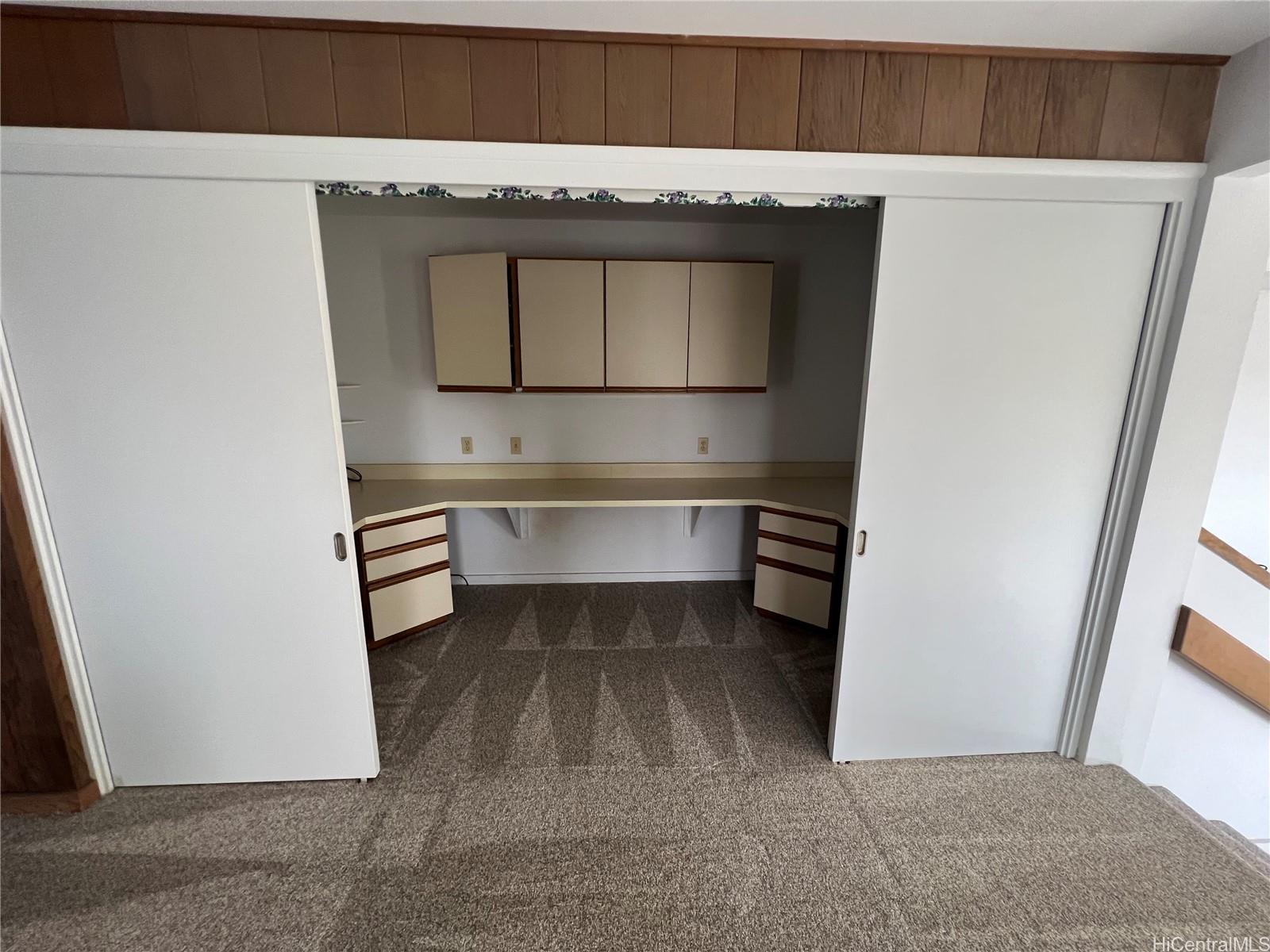 98-1305 Akaaka Street Aiea, HI 96701 - Photo 11 of 23 a room with storage and utility