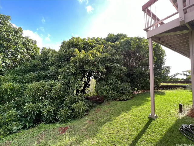 a view of a garden with a lake view
