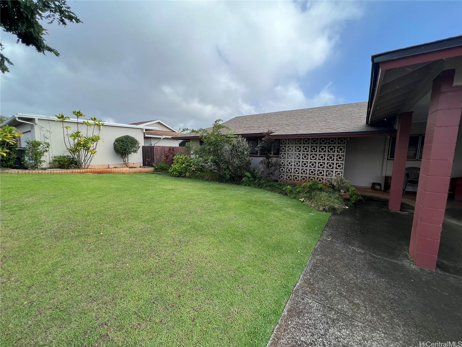 98-1305 Akaaka Street Aiea, HI 96701 - Photo 23 of 23 a front view of a house with garden
