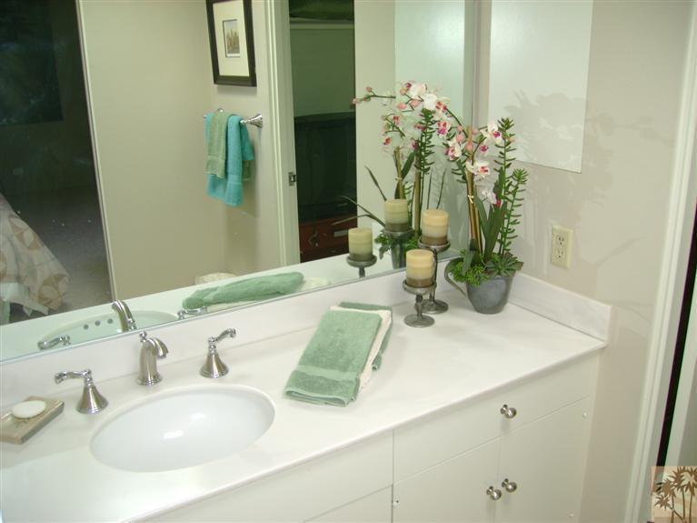 77950 Cherokee Road Indian Wells, CA 92210 - Photo 19 of 22 a bathroom with sink and mirror