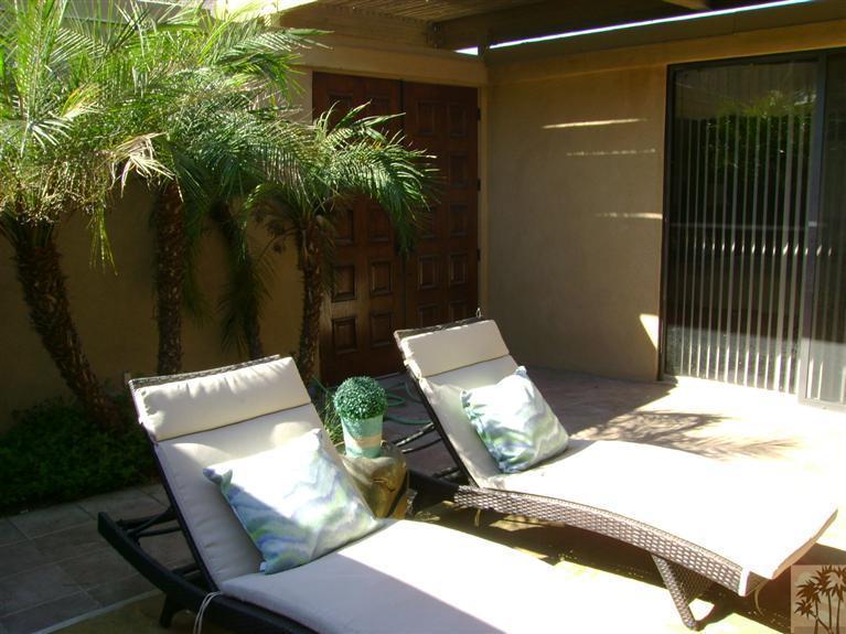 77950 Cherokee Road Indian Wells, CA 92210 - Photo 21 of 22 a view of an outdoor space and seating area