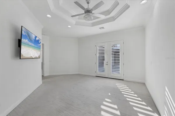 a spacious bathroom with a double vanity sink and a mirror