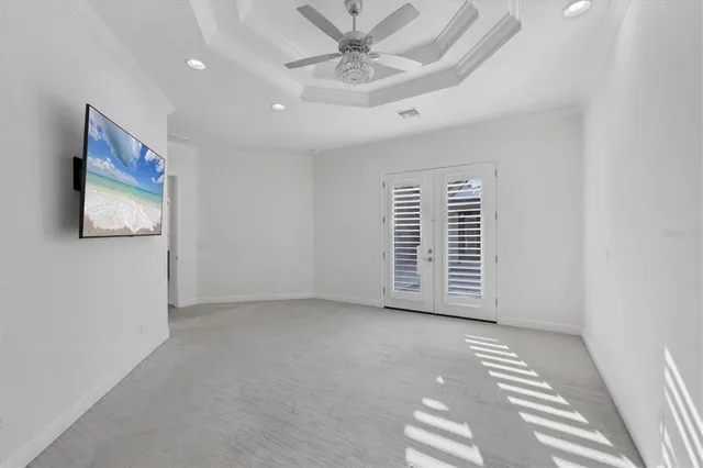 a spacious bathroom with a double vanity sink and a mirror