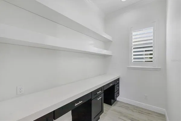 a utility room with sink dryer and washer