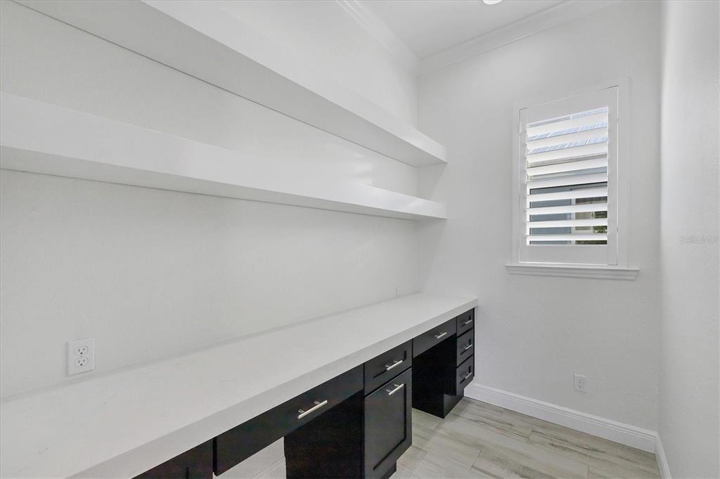 8920 Conch Avenue Placida, FL 33946 - Photo 25 of 57 a room with storage and utility