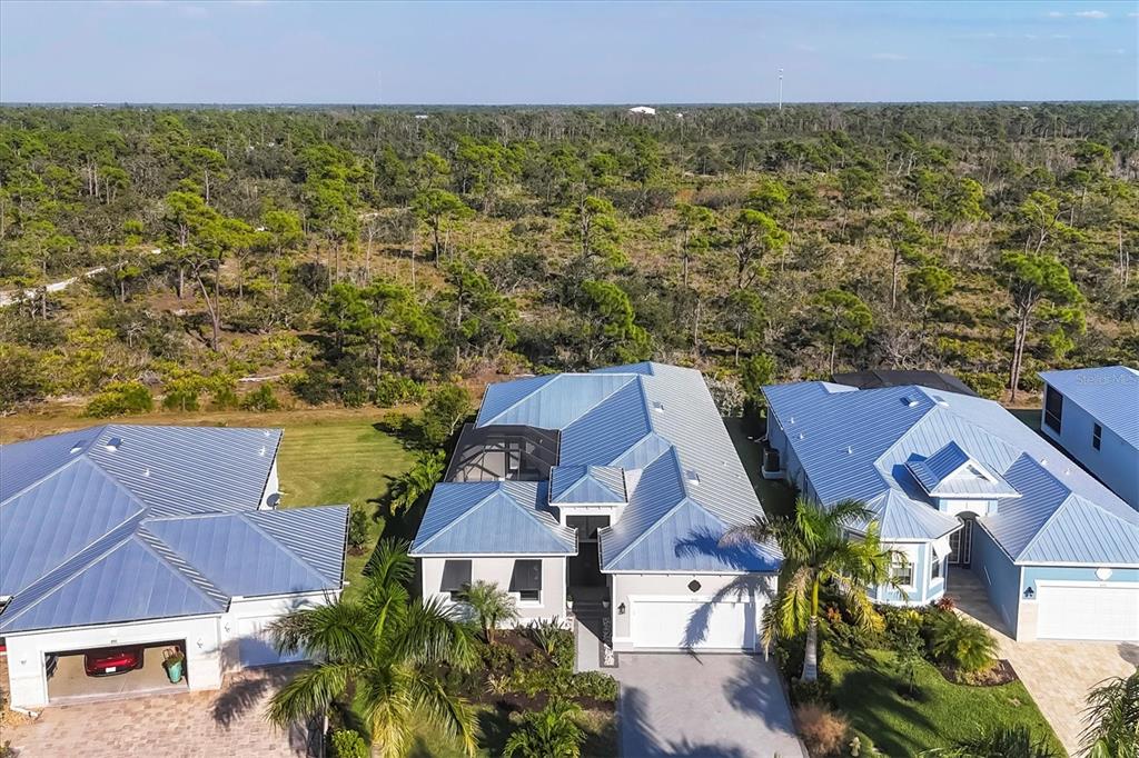 8920 Conch Avenue Placida, FL 33946 - Photo 3 of 57 an aerial view of multiple houses with a yard