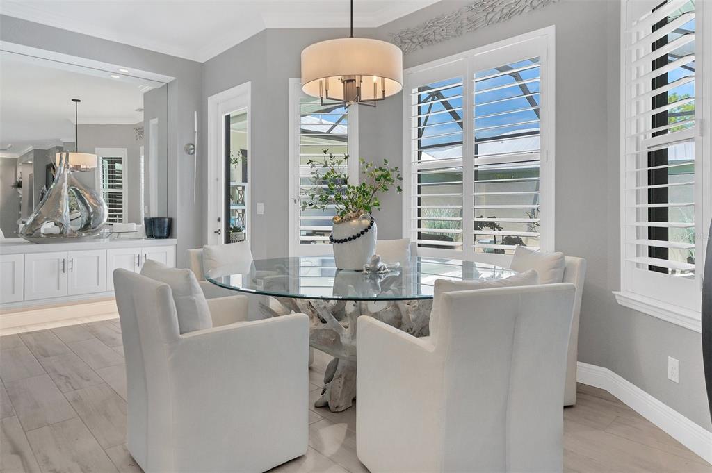 8920 Conch Avenue Placida, FL 33946 - Photo 39 of 57 a dining room with furniture and window