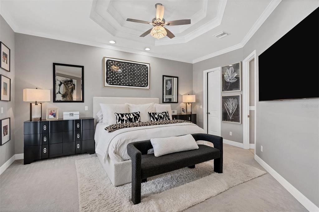 8920 Conch Avenue Placida, FL 33946 - Photo 40 of 57 a bedroom with a bed and a flat screen tv