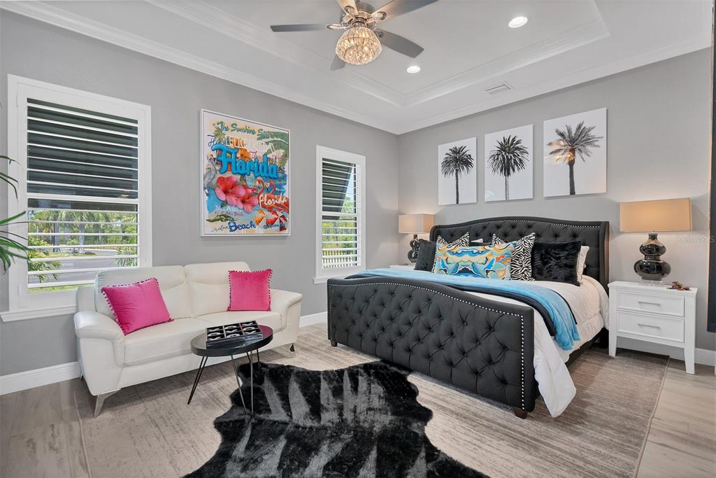 8920 Conch Avenue Placida, FL 33946 - Photo 42 of 57 a bedroom with a bed and furniture