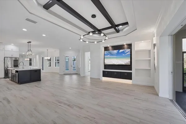 a view of a kitchen with a sink and a kitchen