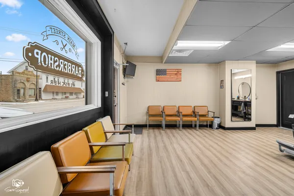 a living room with furniture and a couch