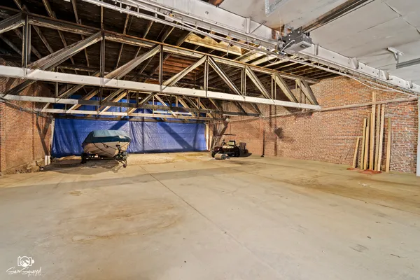 a view of a garage with car parked