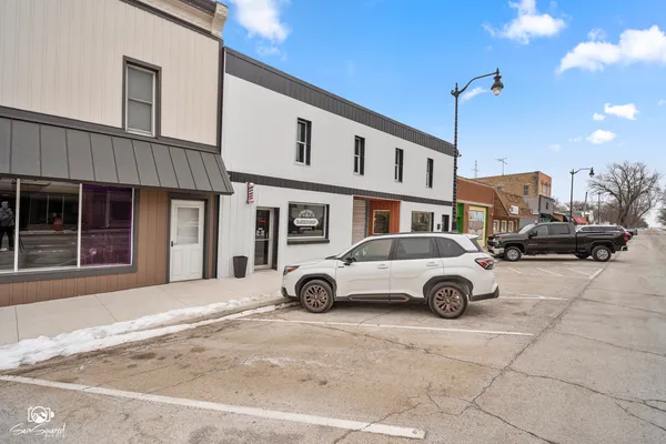 a car parked in front of a building