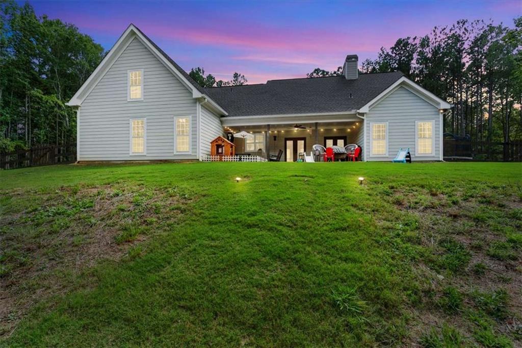 62 Joe Rowell Road Buchanan, GA 30113 - Photo 53 of 63 a front view of house with yard and green space